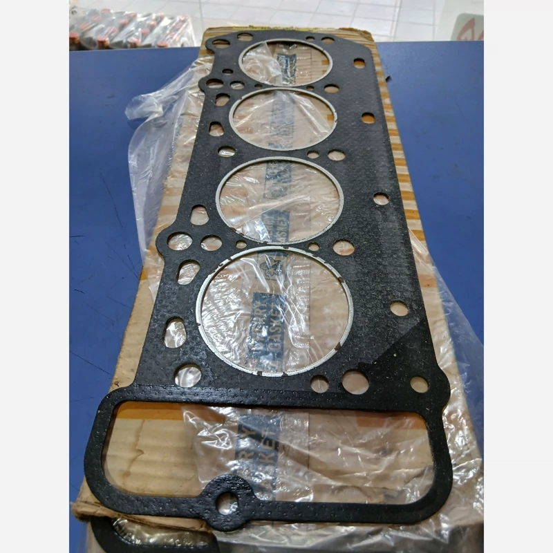 واشر سر سیلندر مزدا وانت 1600 کاغذی یک ونیم میلیمتری اصلی ژاپن (پس کرایه)